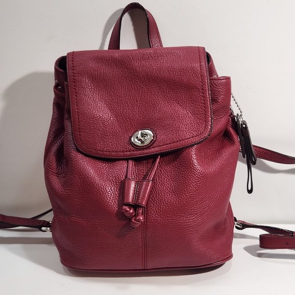 Coach Pebbled Leather Turnlock Drawstring Backpack Maroon Red - Picture 1 of 7